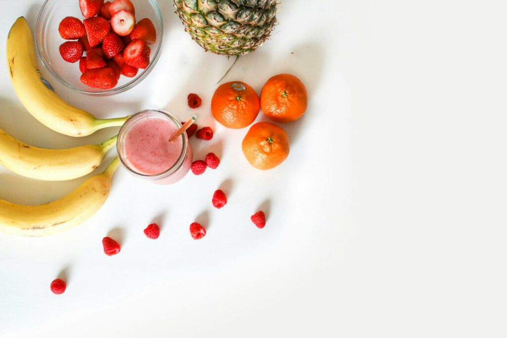 Assorted Fruits On White Surface